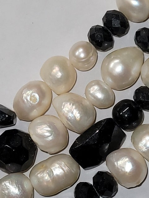 Elegant Pearl and Black Onyx Multistrand Necklace