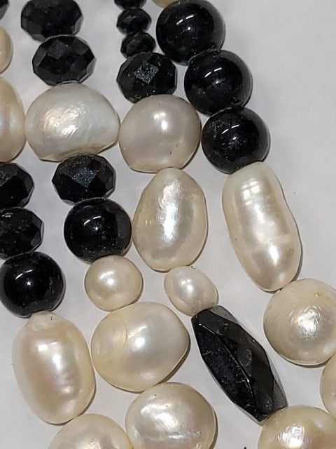 Elegant Pearl and Black Onyx Multistrand Necklace