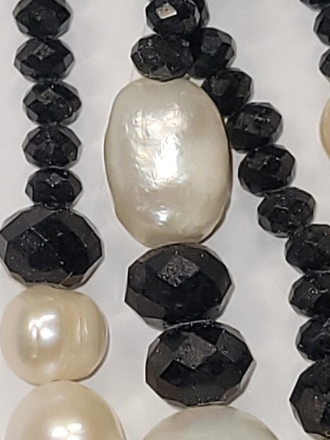 Elegant Pearl and Black Onyx Multistrand Necklace