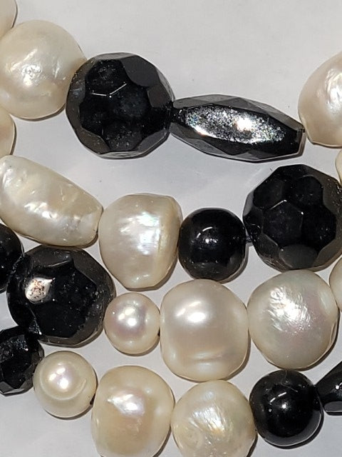 Elegant Pearl and Black Onyx Multistrand Necklace