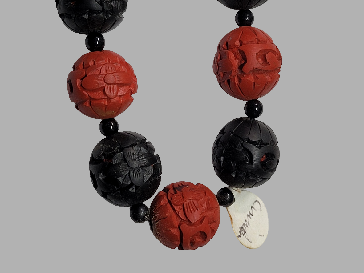 Hand-Carved Cinnabar Bead Necklace with Intricate Floral Patterns Chinese Artistry